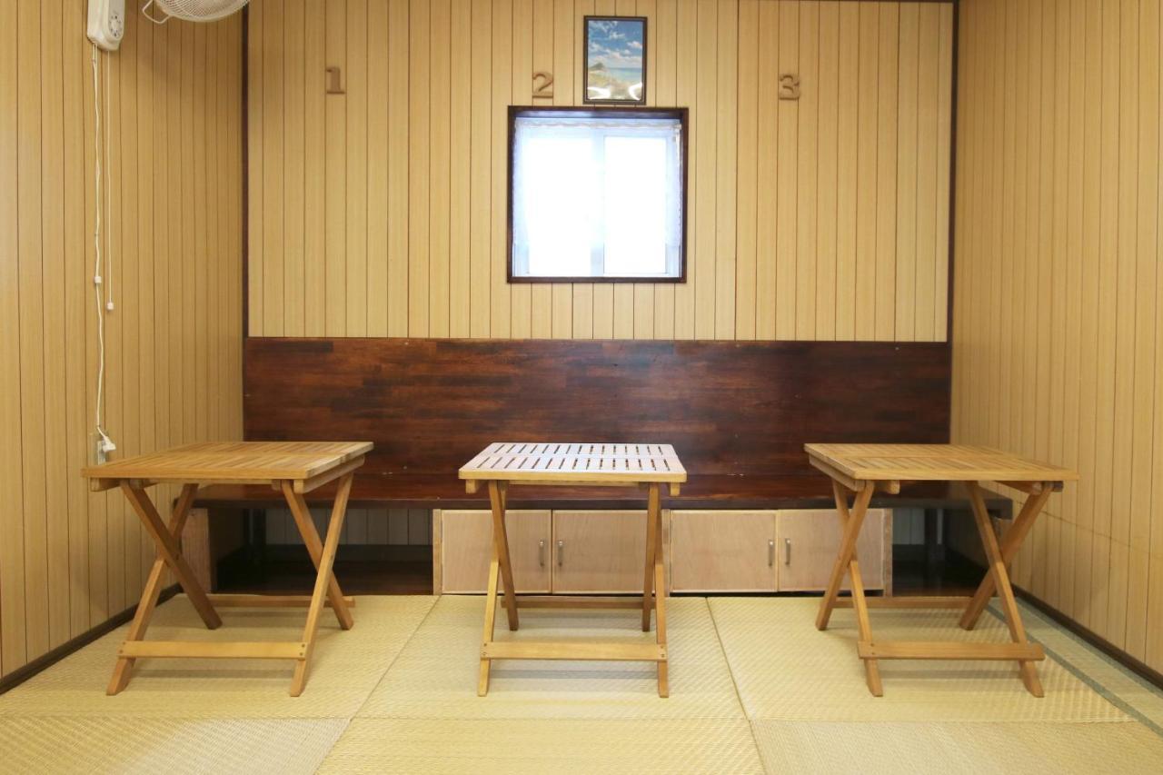 Okinawa Naha Jinjin -沖縄伝統体験型宿じんじん- Bagian luar foto